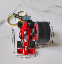 Load image into Gallery viewer, Formula-1 Racing Car &amp; Tire Keychain Featuring a Combination of Two Car Elements
